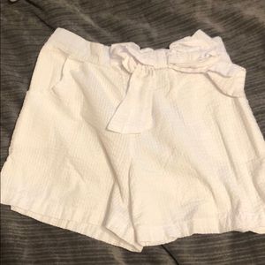 white shorts w bow